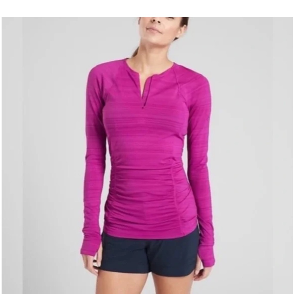 Athleta Contoured Pacifica Top Long Sleeve. Thumb holes. Back zipper pocket.